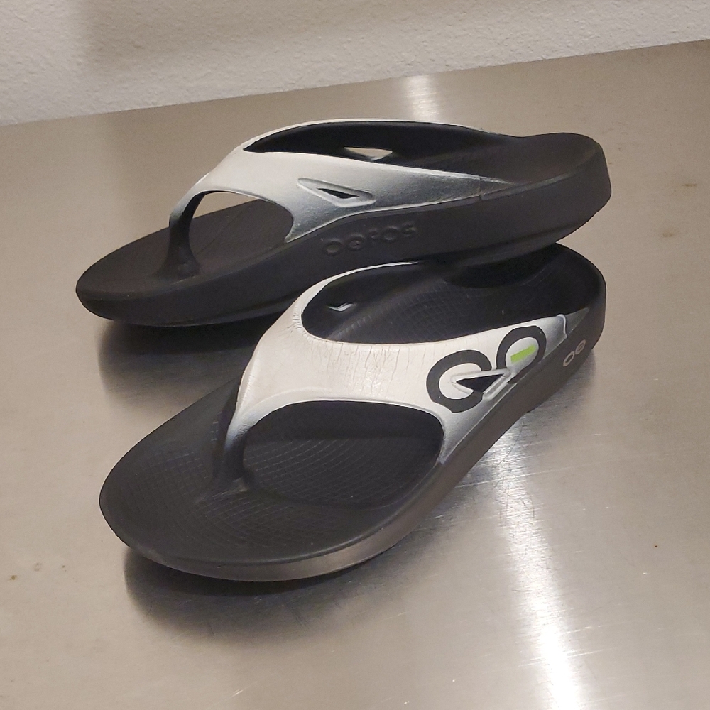 OOFOS Black and Metallic Sandals